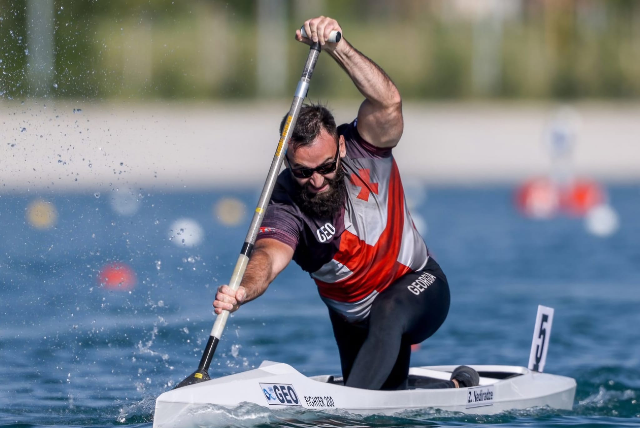 Rector, Academician Davit Gurgenidze congratulates student and rower Zaza Nadiradze on winning a bronze medal at the World Championship